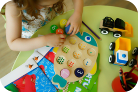 Child Doing Puzzle